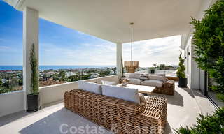 Exclusive designer villa with panoramic sea views for sale in the a five-star golf resort in Marbella - Benahavis 48899 