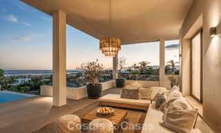Exclusive designer villa with panoramic sea views for sale in the a five-star golf resort in Marbella - Benahavis 74806 