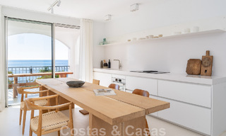Renovated frontline beach apartment for sale in Mediterranean beach complex with panoramic sea views, on the New Golden Mile between Marbella and Estepona 49032 