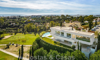 Frontline golf luxury villa in an elegant modern style with stunning golf and sea views for sale in Los Flamingos Golf resort in Marbella - Benahavis 48925