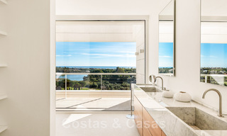 Frontline golf luxury villa in an elegant modern style with stunning golf and sea views for sale in Los Flamingos Golf resort in Marbella - Benahavis 48945 