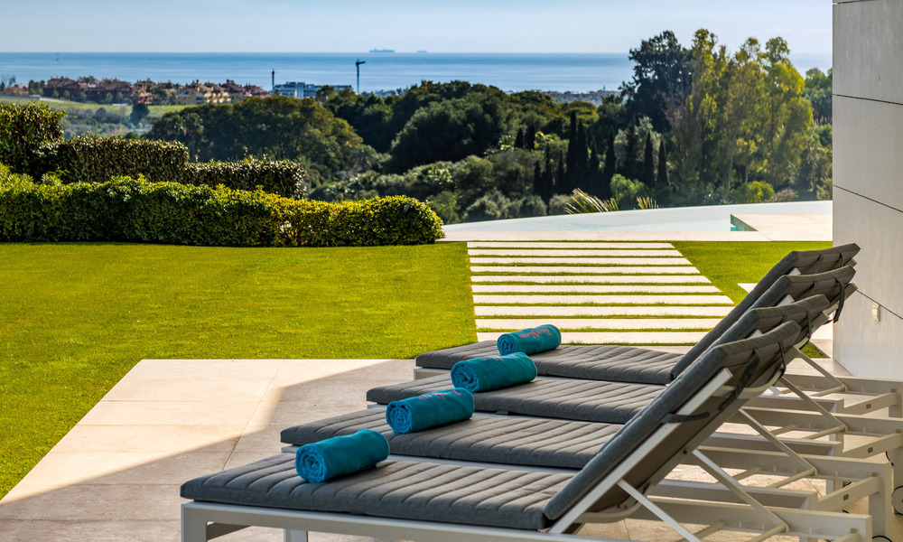 Frontline golf luxury villa in an elegant modern style with stunning golf and sea views for sale in Los Flamingos Golf resort in Marbella - Benahavis 48949