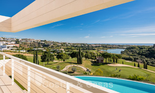 Frontline golf luxury villa in an elegant modern style with stunning golf and sea views for sale in Los Flamingos Golf resort in Marbella - Benahavis 48953 
