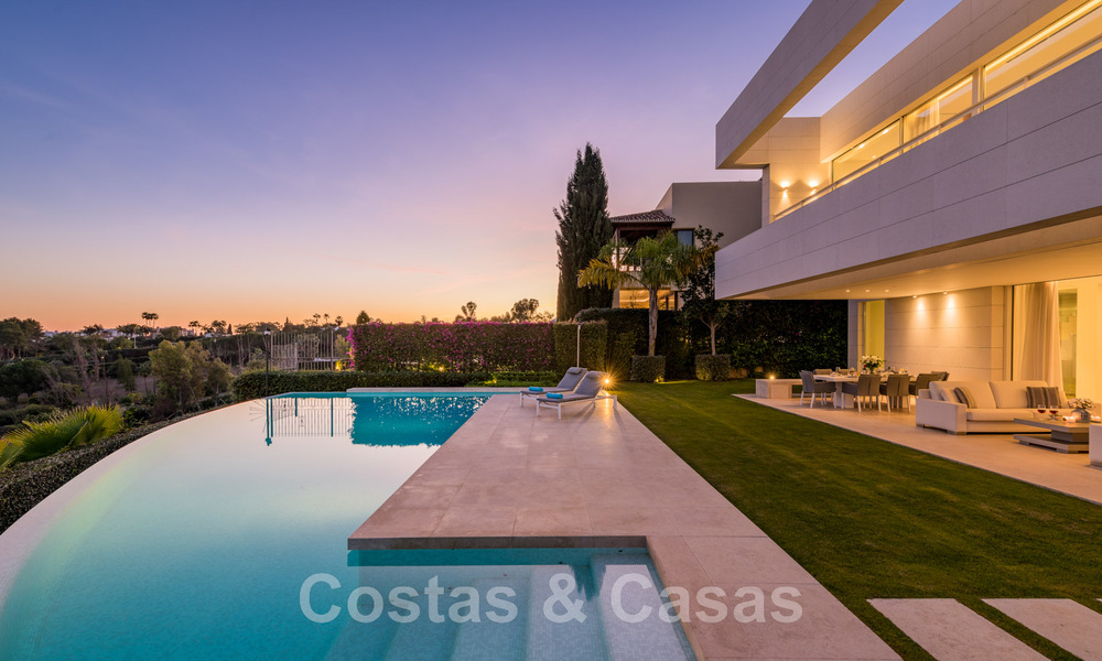 Frontline golf luxury villa in an elegant modern style with stunning golf and sea views for sale in Los Flamingos Golf resort in Marbella - Benahavis 48955