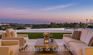 Frontline golf luxury villa in an elegant modern style with stunning golf and sea views for sale in Los Flamingos Golf resort in Marbella - Benahavis 48960 