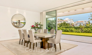 Frontline golf luxury villa in an elegant modern style with stunning golf and sea views for sale in Los Flamingos Golf resort in Marbella - Benahavis 48966 