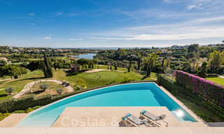 Frontline golf luxury villa in an elegant modern style with stunning golf and sea views for sale in Los Flamingos Golf resort in Marbella - Benahavis 48979 