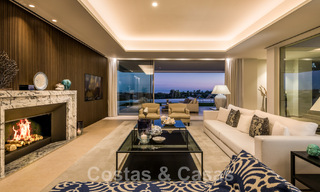 Frontline golf luxury villa in an elegant modern style with stunning golf and sea views for sale in Los Flamingos Golf resort in Marbella - Benahavis 48983 