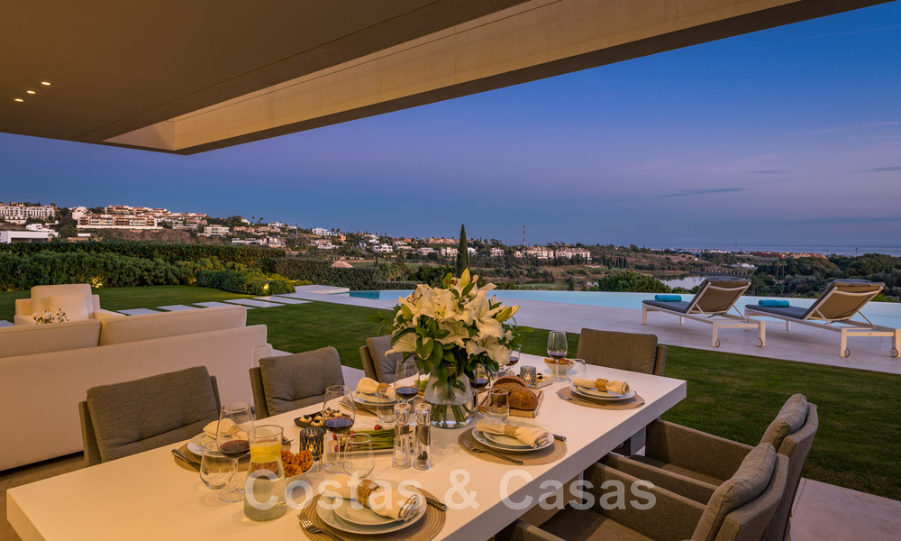 Frontline golf luxury villa in an elegant modern style with stunning golf and sea views for sale in Los Flamingos Golf resort in Marbella - Benahavis 48984