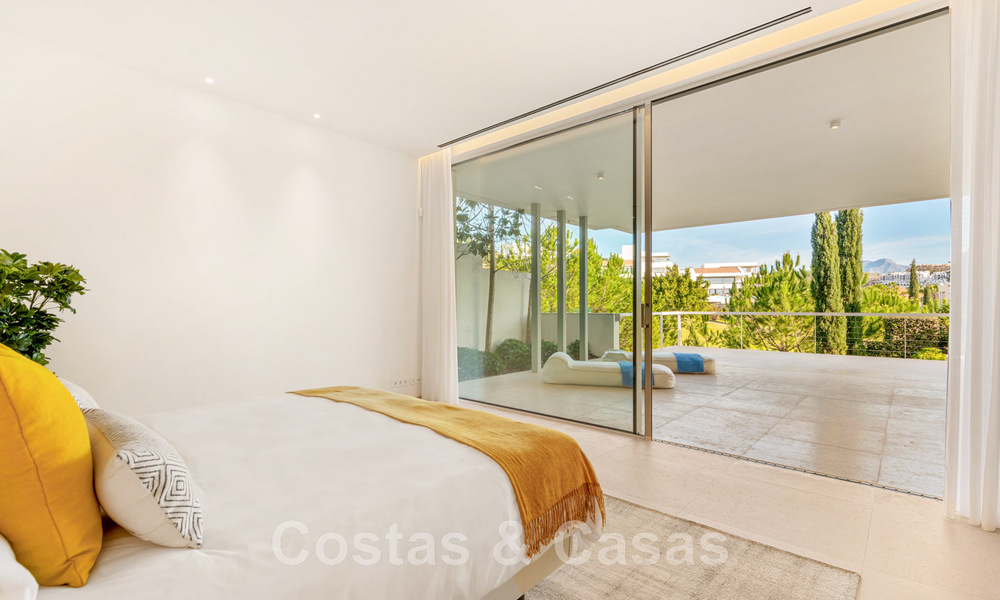 Frontline golf luxury villa in an elegant modern style with stunning golf and sea views for sale in Los Flamingos Golf resort in Marbella - Benahavis 48992