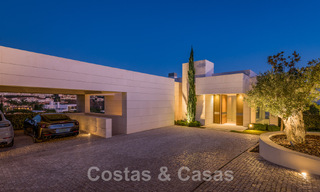 Frontline golf luxury villa in an elegant modern style with stunning golf and sea views for sale in Los Flamingos Golf resort in Marbella - Benahavis 49000 
