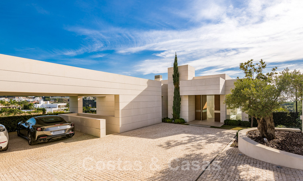 Frontline golf luxury villa in an elegant modern style with stunning golf and sea views for sale in Los Flamingos Golf resort in Marbella - Benahavis 49002