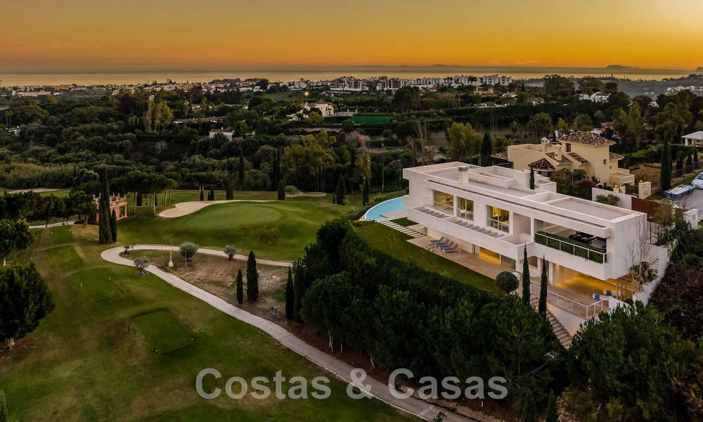 Frontline golf luxury villa in an elegant modern style with stunning golf and sea views for sale in Los Flamingos Golf resort in Marbella - Benahavis 49005