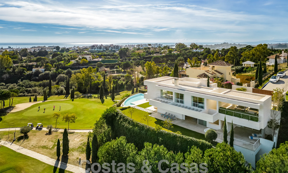 Frontline golf luxury villa in an elegant modern style with stunning golf and sea views for sale in Los Flamingos Golf resort in Marbella - Benahavis 49025