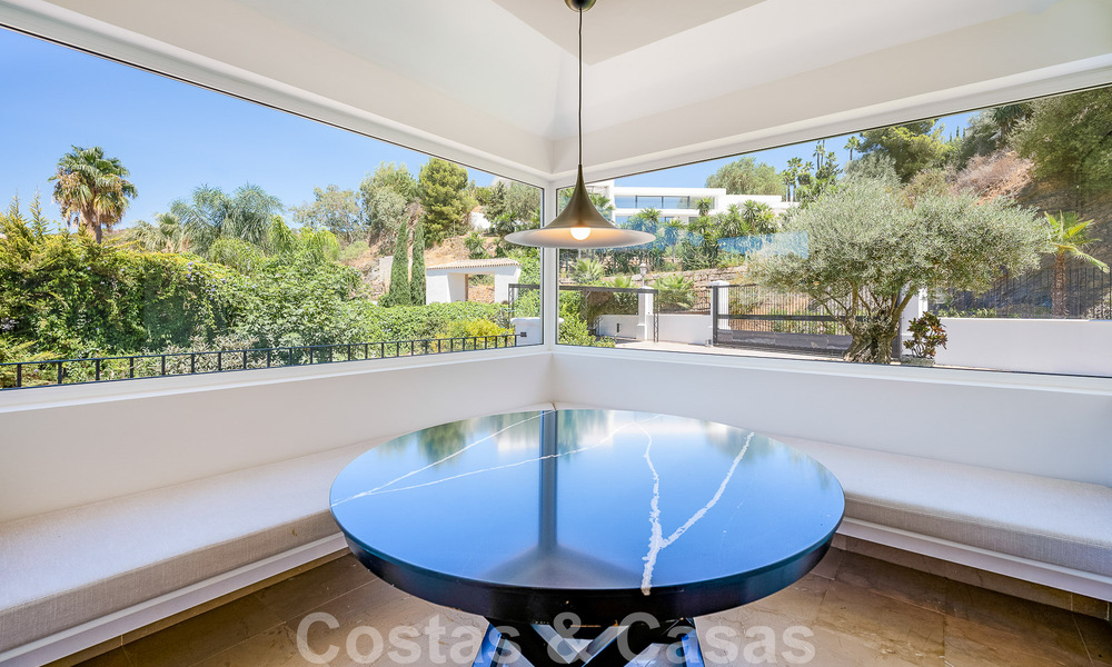 Elegant, Spanish luxury villa for sale with a private tennis court in a gated residential area in La Quinta, Benahavis - Marbella 50401