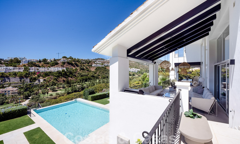 Elegant, Spanish luxury villa for sale with a private tennis court in a gated residential area in La Quinta, Benahavis - Marbella 50450