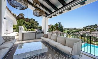 Elegant, Spanish luxury villa for sale with a private tennis court in a gated residential area in La Quinta, Benahavis - Marbella 50453 