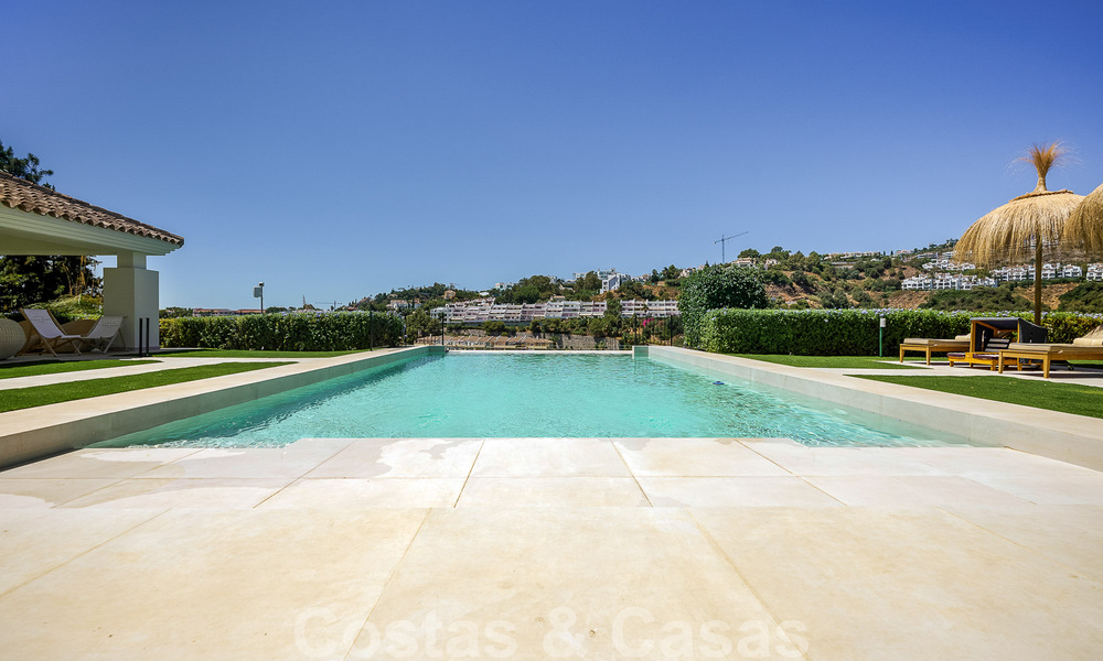 Elegant, Spanish luxury villa for sale with a private tennis court in a gated residential area in La Quinta, Benahavis - Marbella 50461