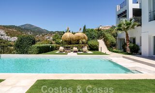 Elegant, Spanish luxury villa for sale with a private tennis court in a gated residential area in La Quinta, Benahavis - Marbella 50462 