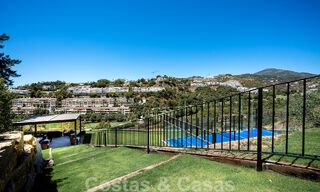 Elegant, Spanish luxury villa for sale with a private tennis court in a gated residential area in La Quinta, Benahavis - Marbella 50466 
