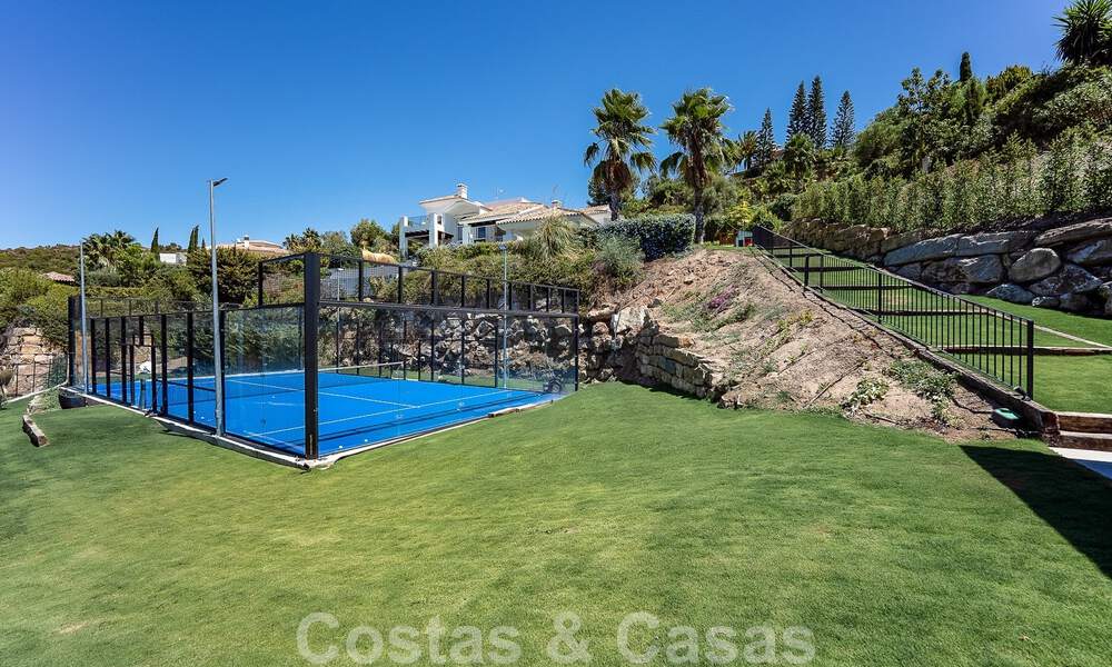 Elegant, Spanish luxury villa for sale with a private tennis court in a gated residential area in La Quinta, Benahavis - Marbella 50467