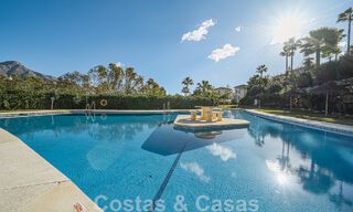 2 exclusive apartments for sale with spacious terrace, private pool and views of La concha mountain in Nueva Andalucia, Marbella 50112 