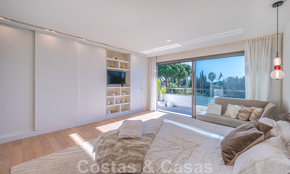 Luxury villa in contemporary architectural style for sale with sea views, located in a desirable residential area on Marbella's Golden Mile 50168