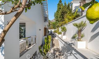 Luxury villa in contemporary architectural style for sale with sea views, located in a desirable residential area on Marbella's Golden Mile 50186 