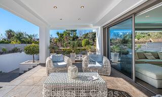 Luxury villa in contemporary architectural style for sale with sea views, located in a desirable residential area on Marbella's Golden Mile 50188 