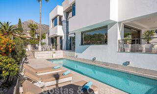 Luxury villa in contemporary architectural style for sale with sea views, located in a desirable residential area on Marbella's Golden Mile 50199 