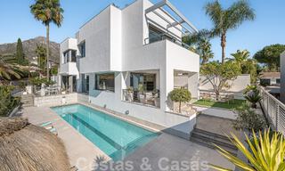 Luxury villa in contemporary architectural style for sale with sea views, located in a desirable residential area on Marbella's Golden Mile 50200 