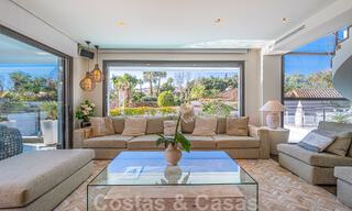 Luxury villa in contemporary architectural style for sale with sea views, located in a desirable residential area on Marbella's Golden Mile 50205 