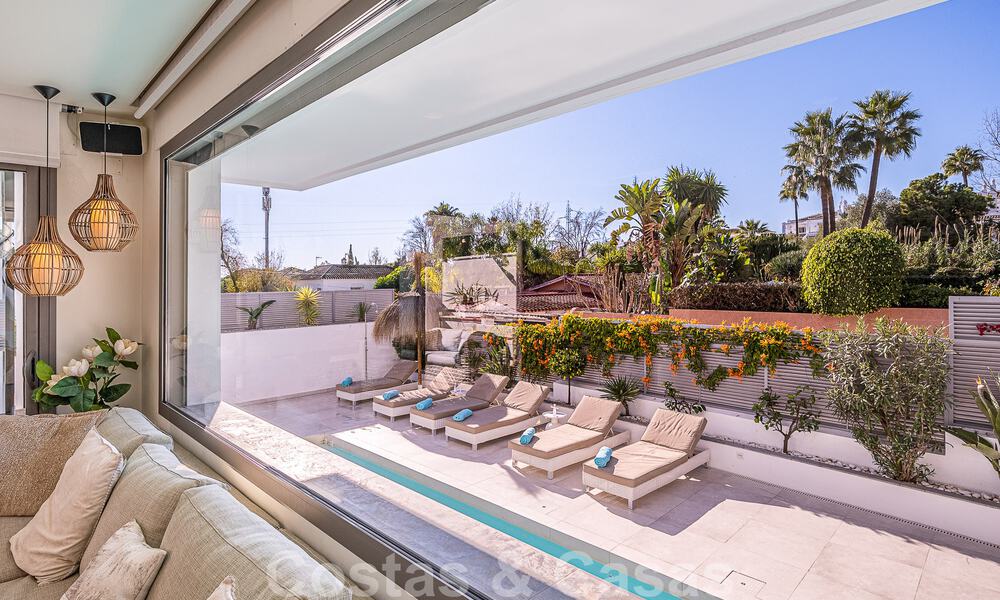 Luxury villa in contemporary architectural style for sale with sea views, located in a desirable residential area on Marbella's Golden Mile 50207