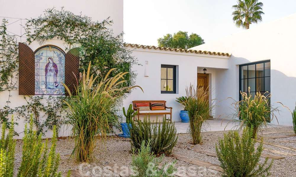 Attractive, distinctive Ibiza-style villa for sale with large separate guest house located in West Marbella 49920