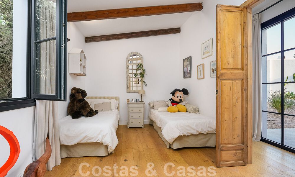 Attractive, distinctive Ibiza-style villa for sale with large separate guest house located in West Marbella 49932