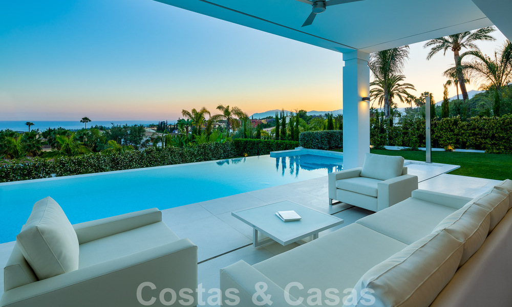 Contemporary, detached luxury villa for sale with panoramic mountain and sea views, heart of Marbella's Golden Mile 49901