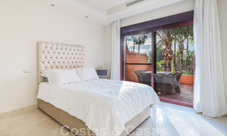 Semi-detached Spanish-style house for sale in a prestigious urbanisation within walking distance of Puerto Banus and the beach in Nueva Andalucia, Marbella 49739 