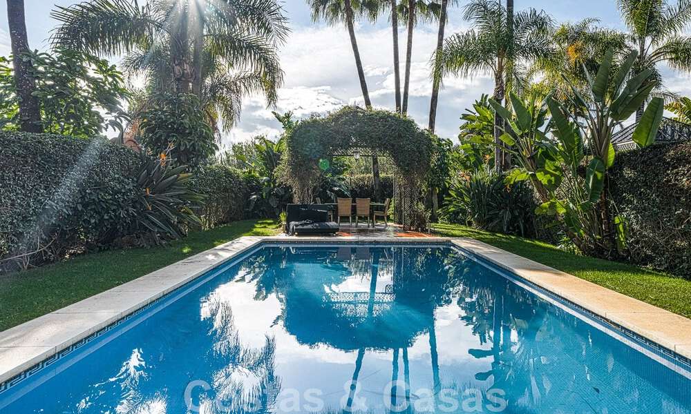 Semi-detached Spanish-style house for sale in a prestigious urbanisation within walking distance of Puerto Banus and the beach in Nueva Andalucia, Marbella 49745