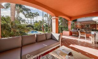Semi-detached Spanish-style house for sale in a prestigious urbanisation within walking distance of Puerto Banus and the beach in Nueva Andalucia, Marbella 49748 