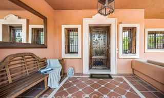 Semi-detached Spanish-style house for sale in a prestigious urbanisation within walking distance of Puerto Banus and the beach in Nueva Andalucia, Marbella 49752 