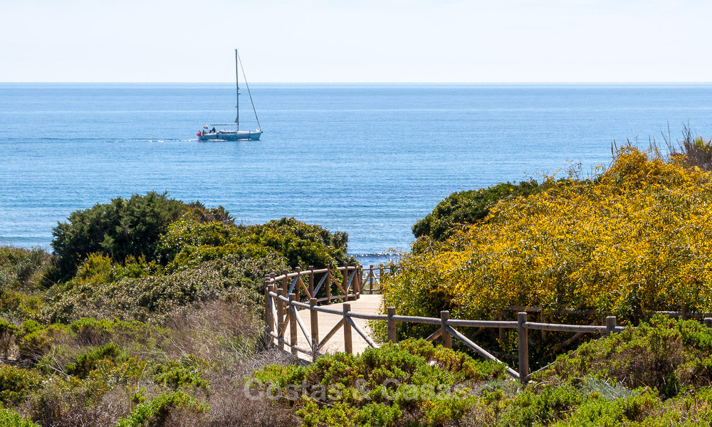 Charming Spanish luxury villa for sale surrounded by natural beauty and bordering the dunes beach in Marbella 49712