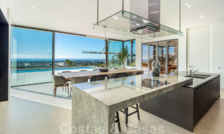 Move-in ready, architectural designer villa for sale with open sea views in a prestigious gated residential area in the hills of La Quinta in Benahavis - Marbella 49252 