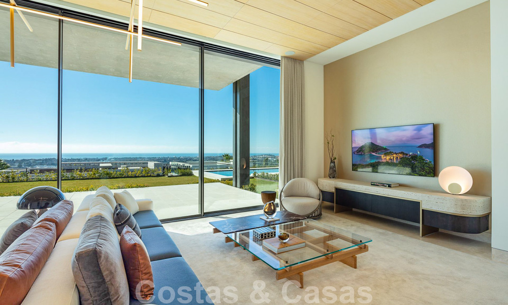 Move-in ready, architectural designer villa for sale with open sea views in a prestigious gated residential area in the hills of La Quinta in Benahavis - Marbella 49254