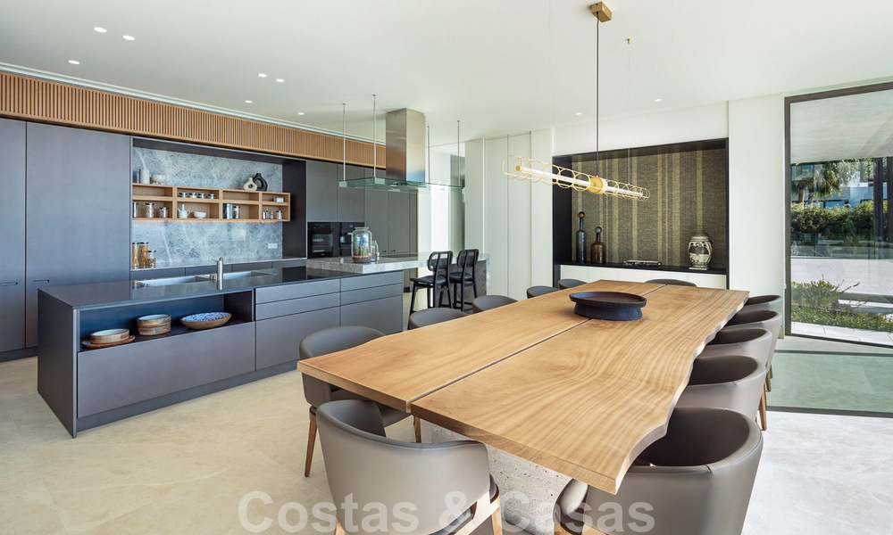 Move-in ready, architectural designer villa for sale with open sea views in a prestigious gated residential area in the hills of La Quinta in Benahavis - Marbella 49257