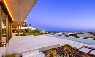 Move-in ready, architectural designer villa for sale with open sea views in a prestigious gated residential area in the hills of La Quinta in Benahavis - Marbella 49261 