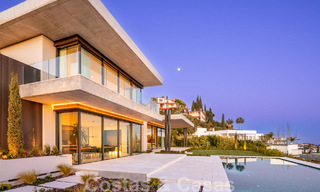 Move-in ready, architectural designer villa for sale with open sea views in a prestigious gated residential area in the hills of La Quinta in Benahavis - Marbella 49262 