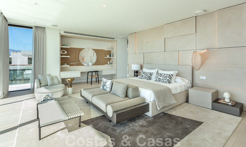 Move-in ready, architectural designer villa for sale with open sea views in a prestigious gated residential area in the hills of La Quinta in Benahavis - Marbella 49263