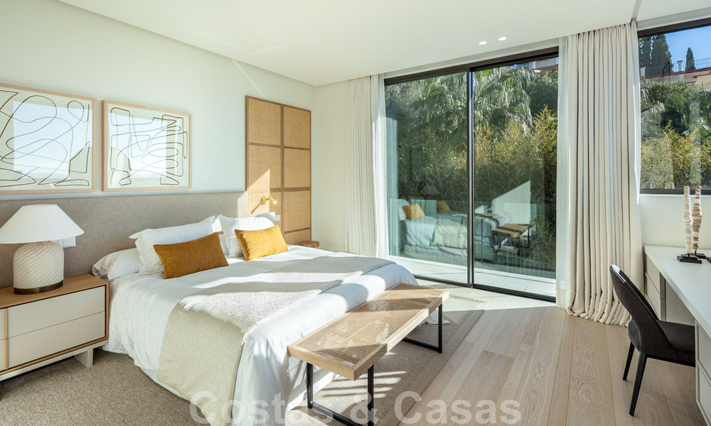 Move-in ready, architectural designer villa for sale with open sea views in a prestigious gated residential area in the hills of La Quinta in Benahavis - Marbella 49266