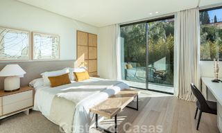 Move-in ready, architectural designer villa for sale with open sea views in a prestigious gated residential area in the hills of La Quinta in Benahavis - Marbella 49266 