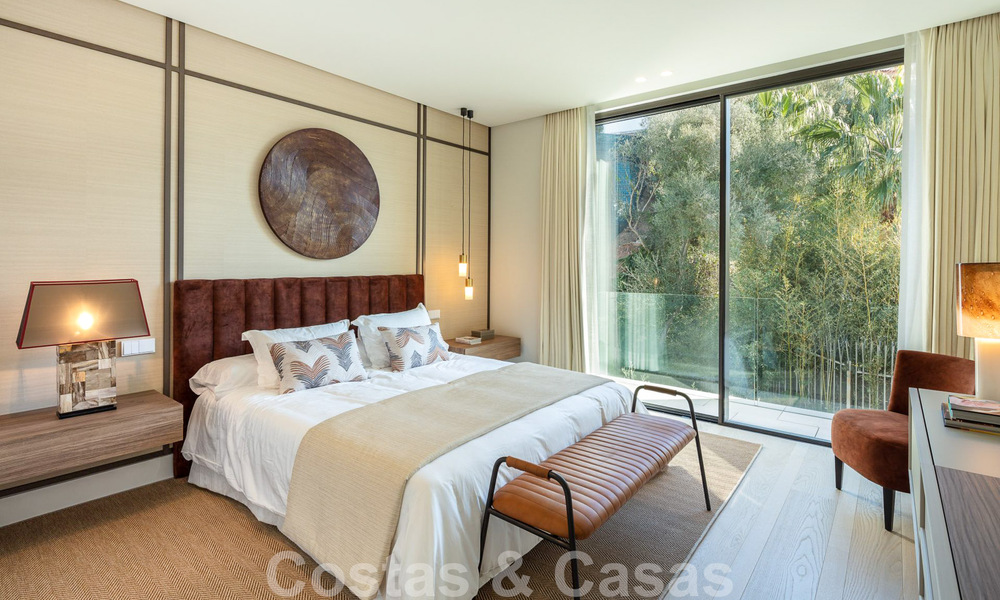 Move-in ready, architectural designer villa for sale with open sea views in a prestigious gated residential area in the hills of La Quinta in Benahavis - Marbella 49268